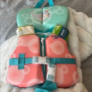 Speedo Teal and Pink ' Life Vest infant up to 30 lbs